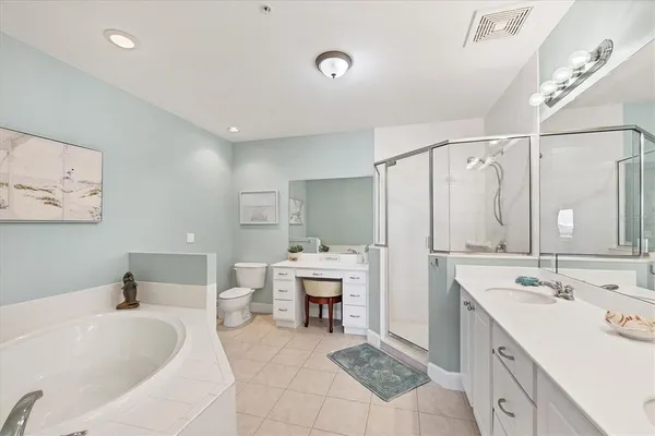 a view of a balcony with wooden floor