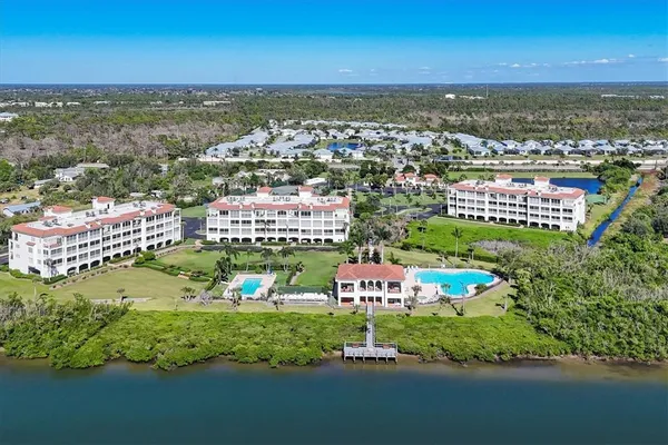 a view of a swimming pool with a lake
