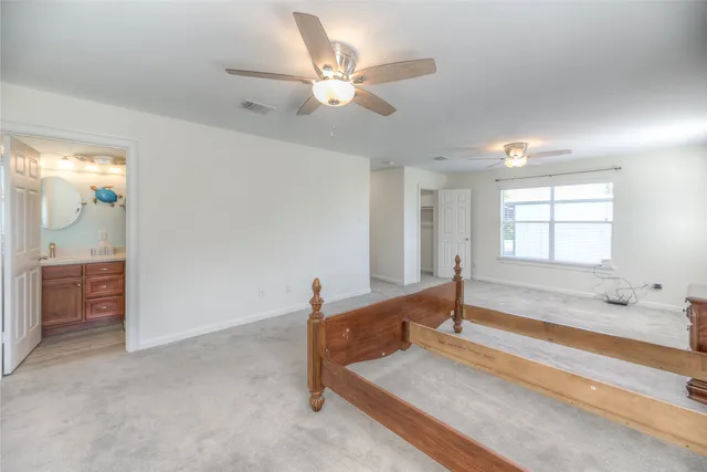 a living room with furniture and white walls