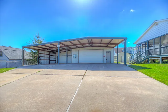 a view of a house with a garage