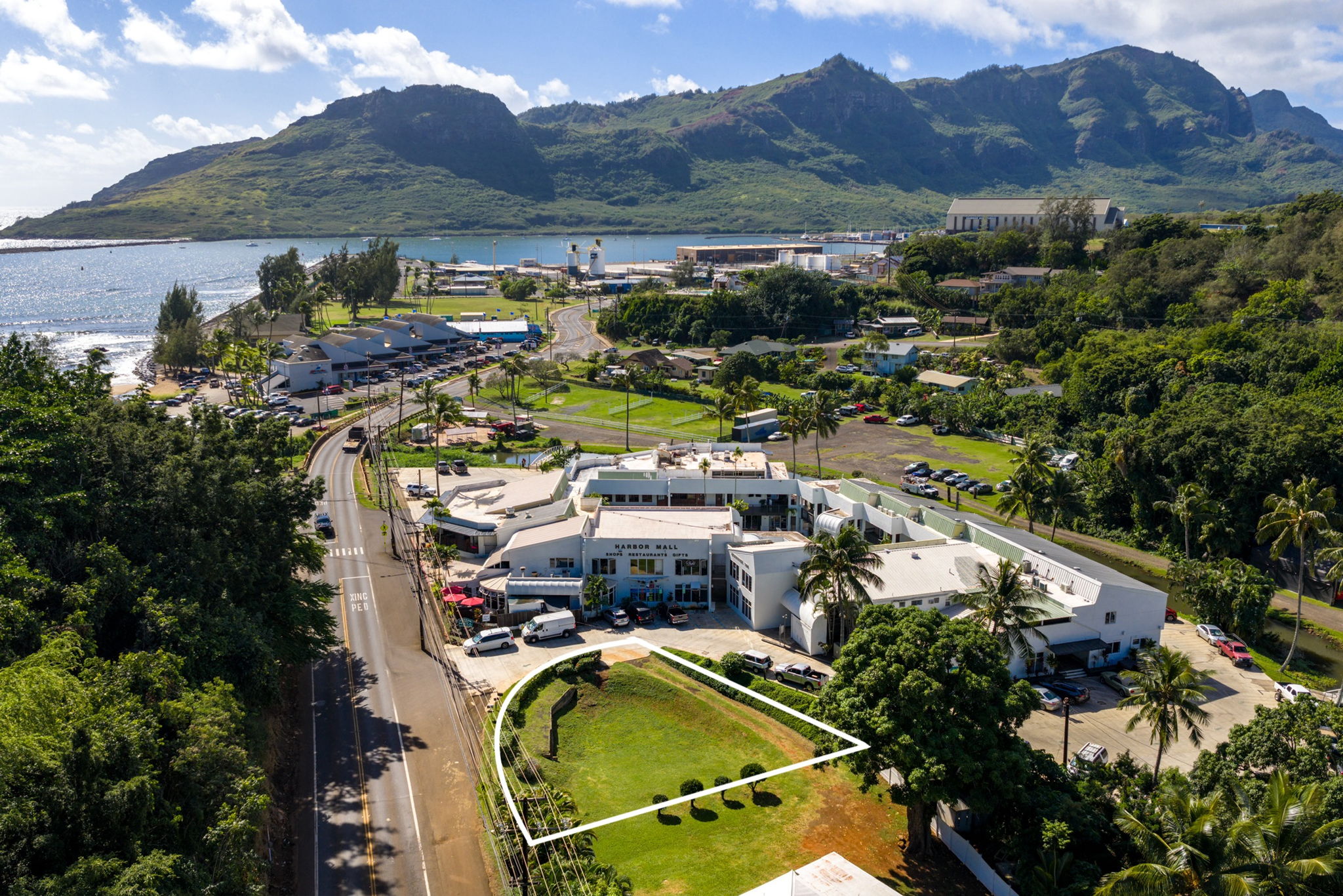 an aerial view of residential houses and outdoor space