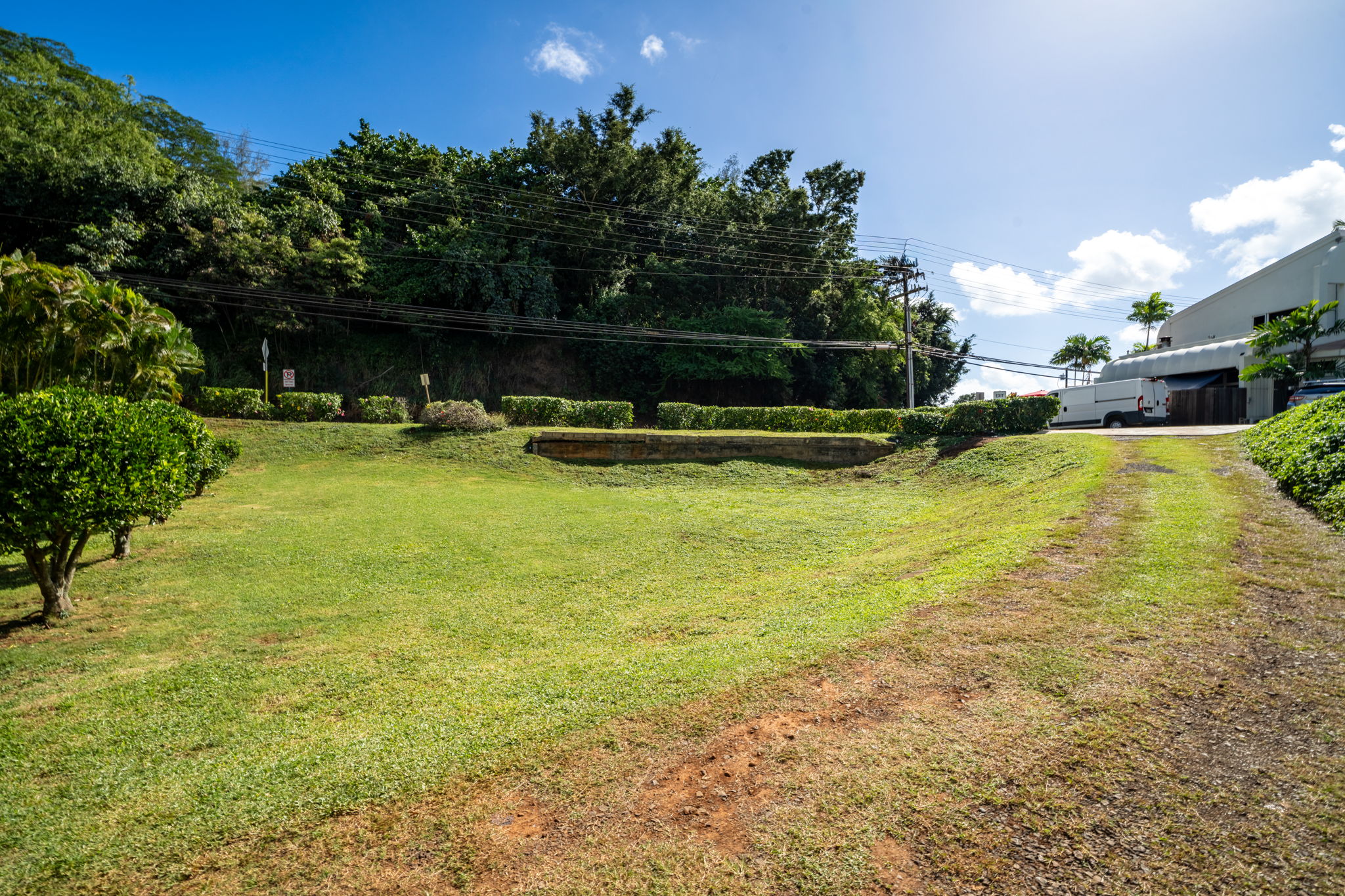 3531 Lot B-1-a Rice Street Lihue, HI 96766 - Photo 4 of 16 a view of a swimming pool with a patio and a yard