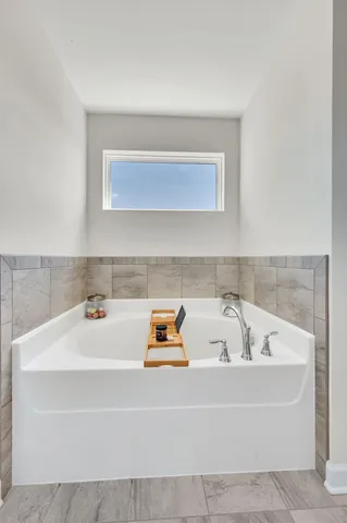 a bathroom with a bathtub