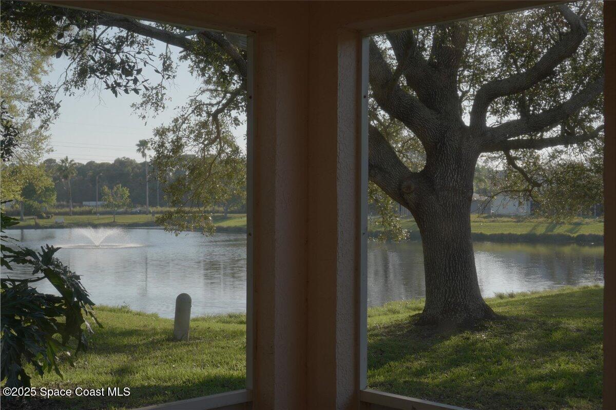 295 Oak Lake Road Melbourne, FL 32901 - Photo 2 of 40 a view of a lake from a balcony