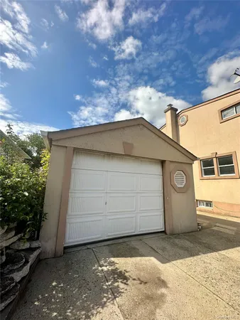 a view of a house with a garage