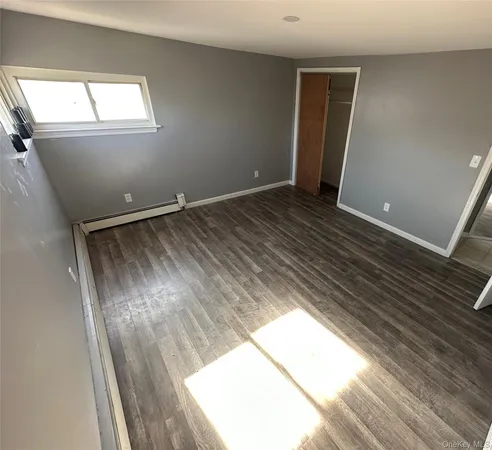 a view of small space with wooden floor