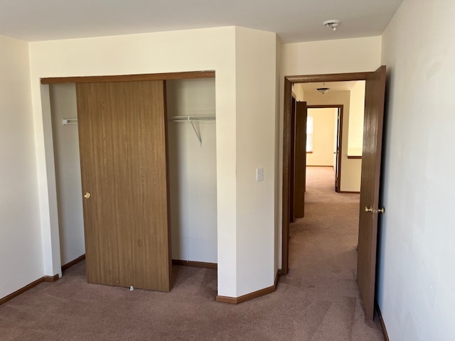 122 Polaris Drive Lake In The Hills, IL 60156 - Photo 17 of 23 a view of a hallway with closet