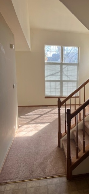 122 Polaris Drive Lake In The Hills, IL 60156 - Photo 2 of 23 a view of an empty room with a window
