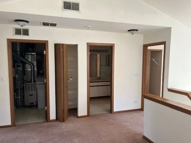 a view of an empty room and window