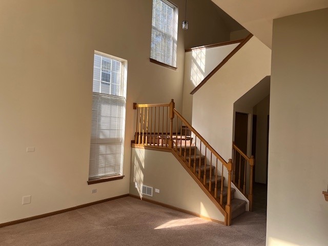122 Polaris Drive Lake In The Hills, IL 60156 - Photo 6 of 23 a view of an entryway with staircase