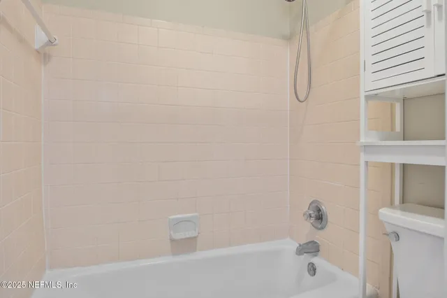 a bathroom with a bathtub