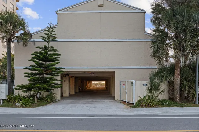 a kitchen with a refrigerator a sink and a stove