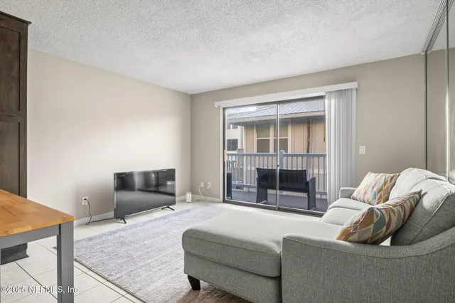 a living room with furniture and a couch