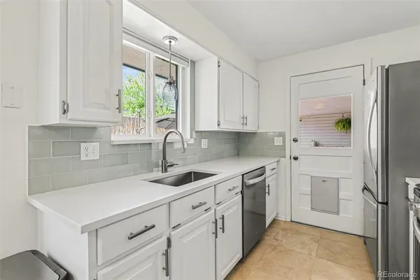 $585,000 | 8958 West 77th Place, Arvada, CO 80005