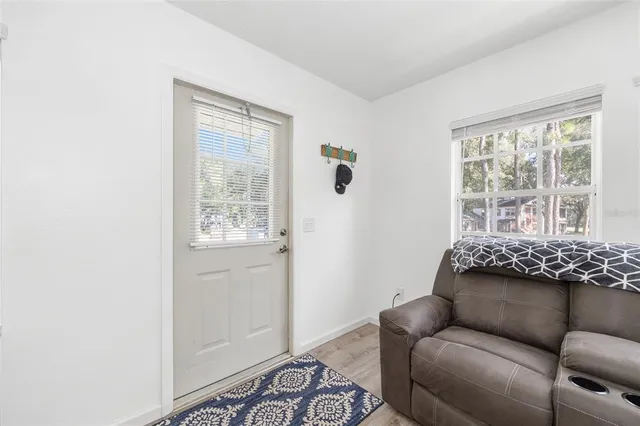 a living room with furniture and a window