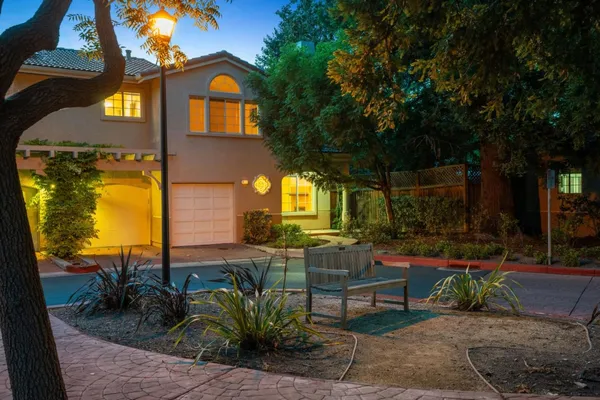 a view of a house with a swimming pool