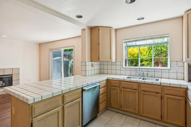 a backyard of a house with seating space