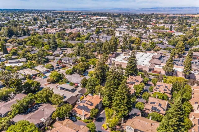 a view of a sitting area with furniture and backyard