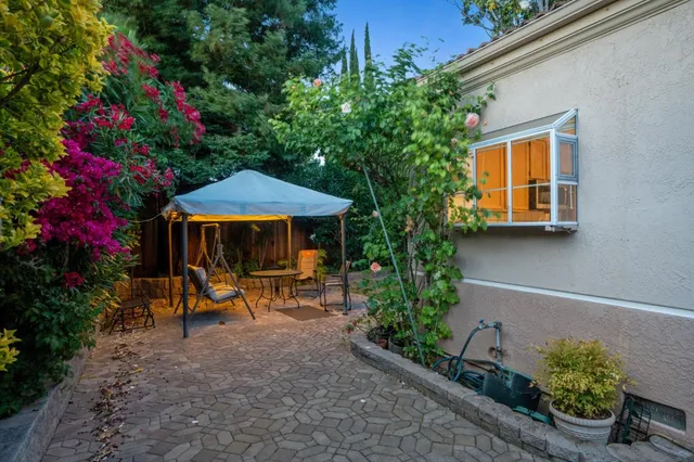 a bathroom with a shower sink and mirror