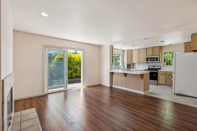 a bathroom with a sink mirror and vanity