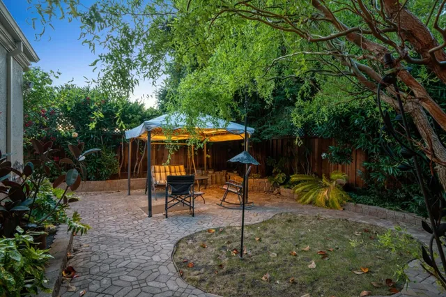 a view of a house with a garden