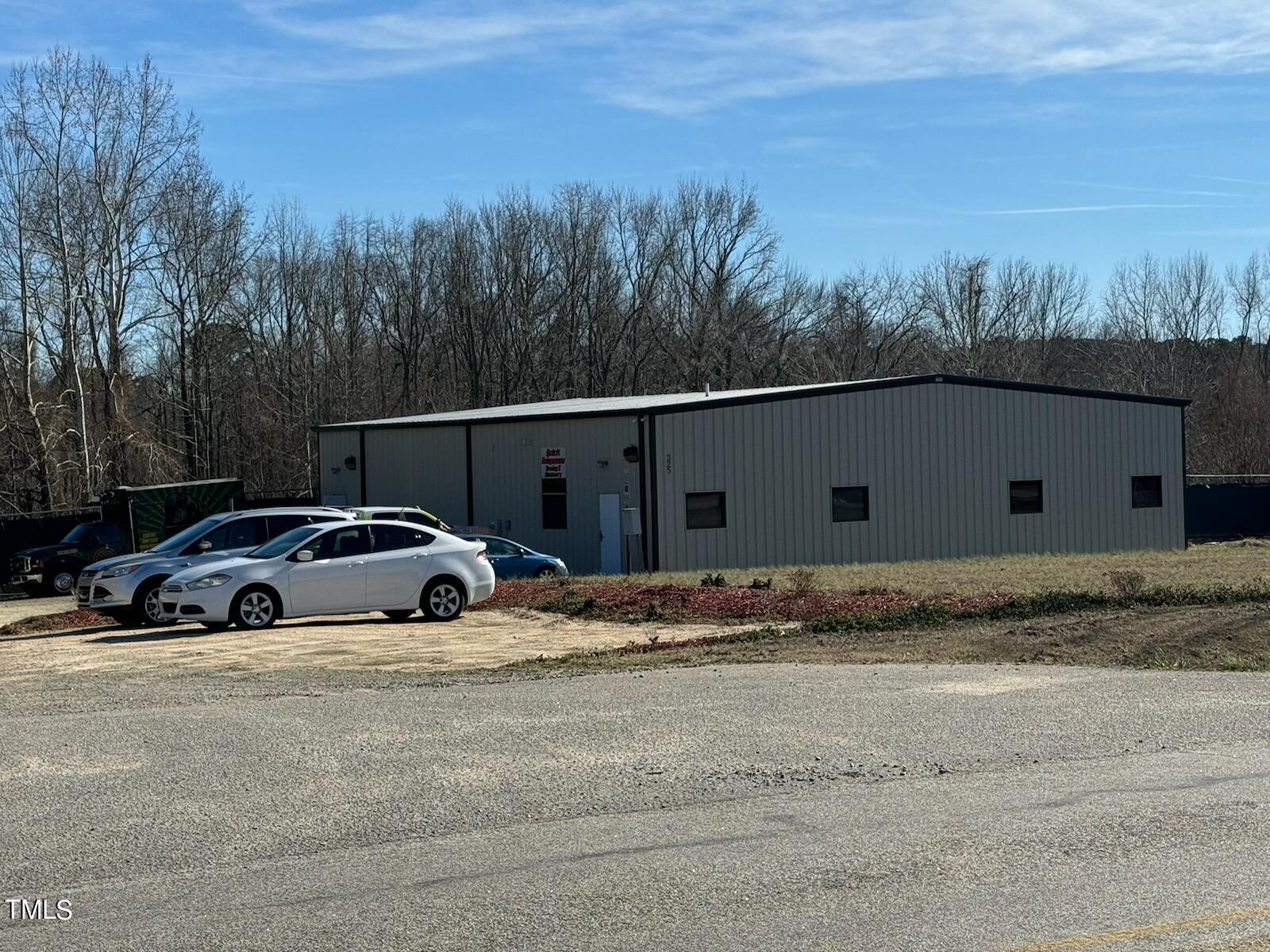 325 Slate Top House Road Clayton, NC 27520 - Photo 2 of 4 a view of street next to a yard