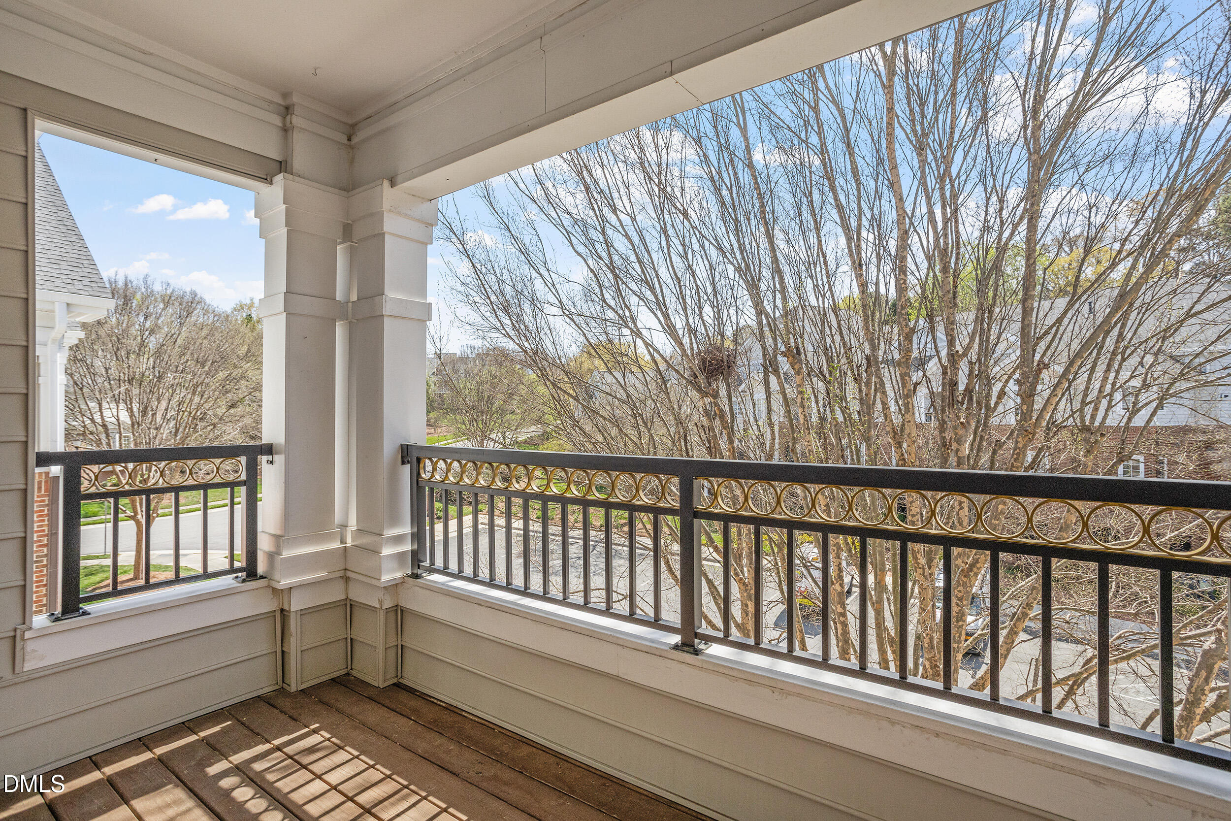 3700 Baron Cooper Pass, Unit 204 Raleigh, NC 27612 - Photo 10 of 45 a view of a balcony with wooden floor