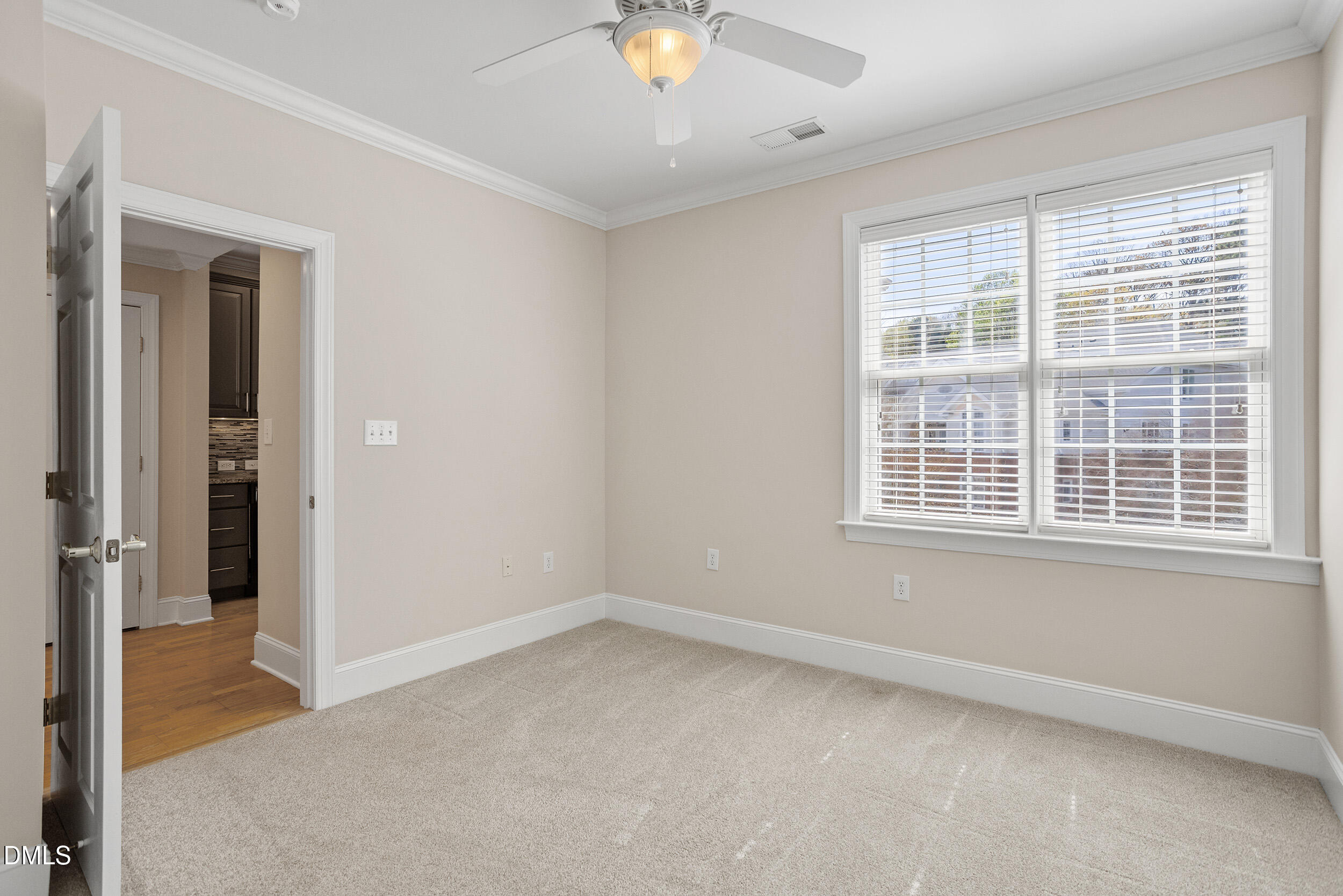 3700 Baron Cooper Pass, Unit 204 Raleigh, NC 27612 - Photo 27 of 45 an empty room with a window