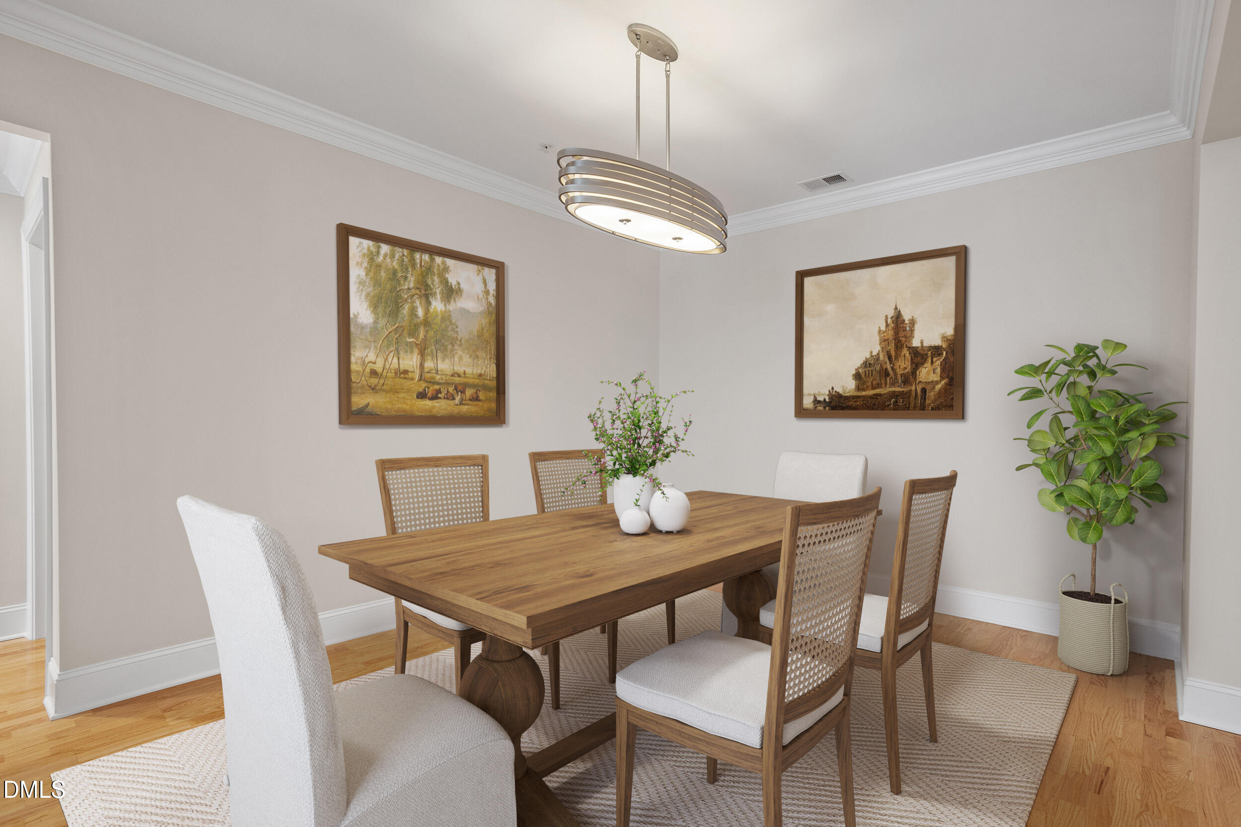 3700 Baron Cooper Pass, Unit 204 Raleigh, NC 27612 - Photo 3 of 45 a view of a dining room with furniture and wooden floor