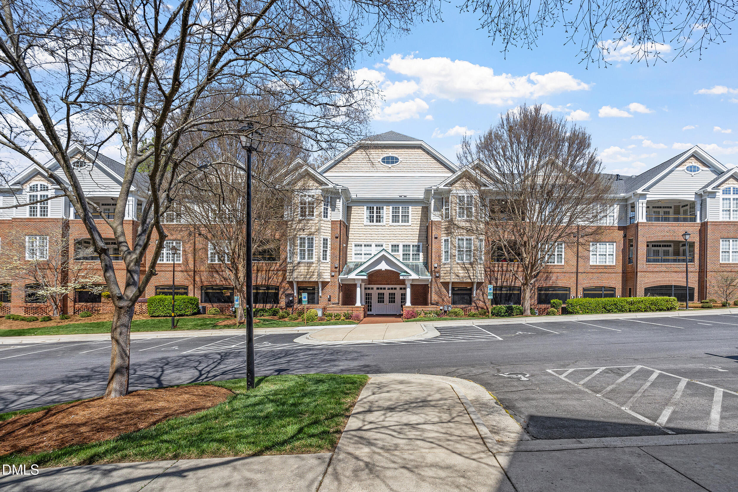 3700 Baron Cooper Pass, Unit 204 Raleigh, NC 27612 - Photo 6 of 45 a front view of a building with street view