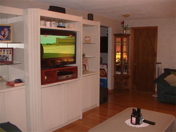 26 Harjean Road Billerica, MA 01821 - Photo 14 of 25 a hallway with wooden floor