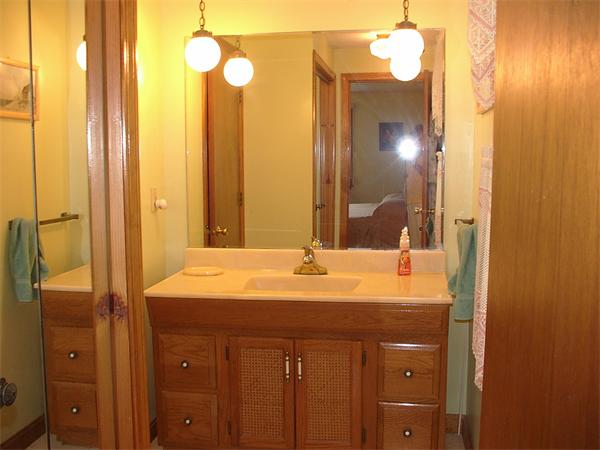 26 Harjean Road Billerica, MA 01821 - Photo 17 of 25 a bathroom with a sink and a mirror