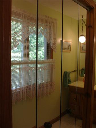 26 Harjean Road Billerica, MA 01821 - Photo 18 of 25 a bathroom with a glass shower door