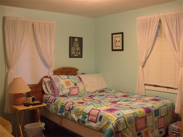 26 Harjean Road Billerica, MA 01821 - Photo 22 of 25 a bedroom with a bed and a window