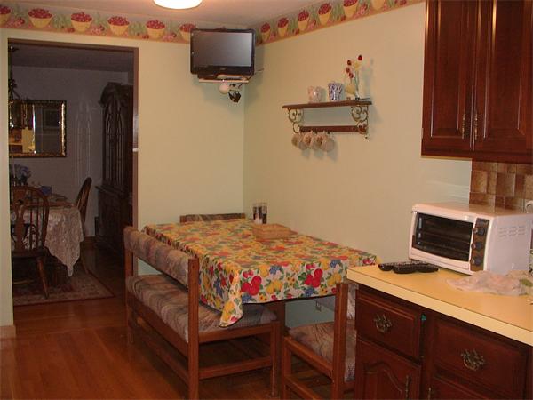 26 Harjean Road Billerica, MA 01821 - Photo 9 of 25 a bedroom with a bed and wooden floor