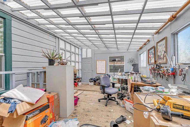 a room with furniture and a window