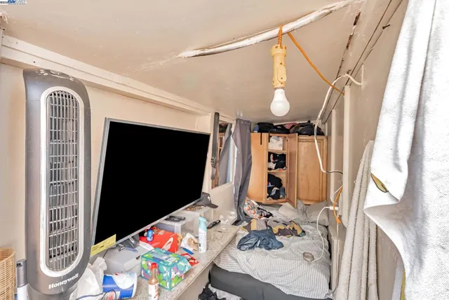 a room with storage and utility room