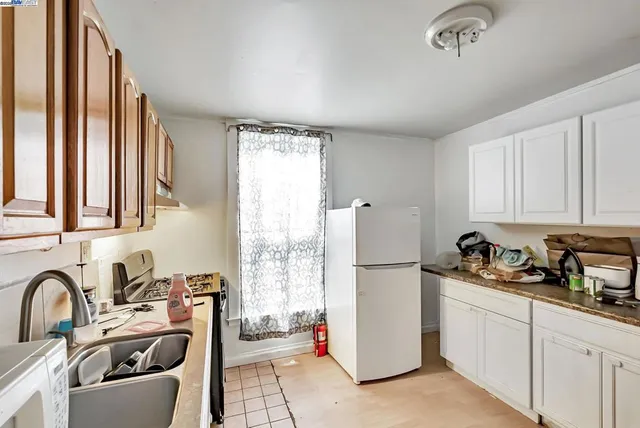 a bed room with a bed and a desk