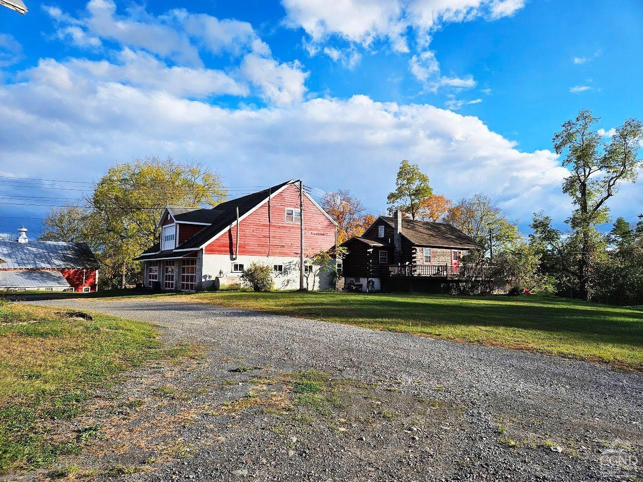 274 Fingar Road Hudson, NY 12534 - Photo 30 of 87 a front view of a house with a yard and fountain in middle
