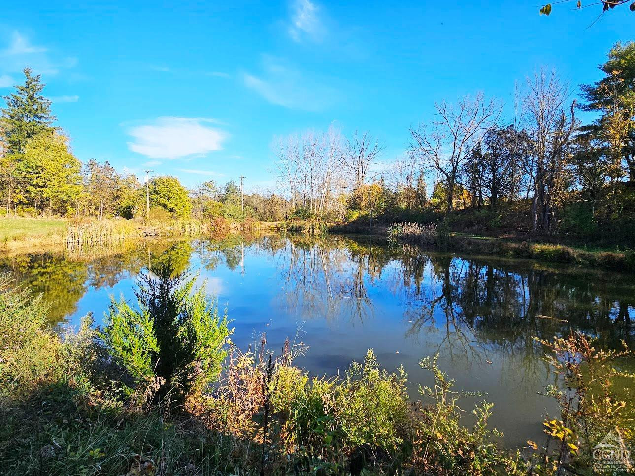 274 Fingar Road Hudson, NY 12534 - Photo 33 of 87 a view of a lake with houses in all around