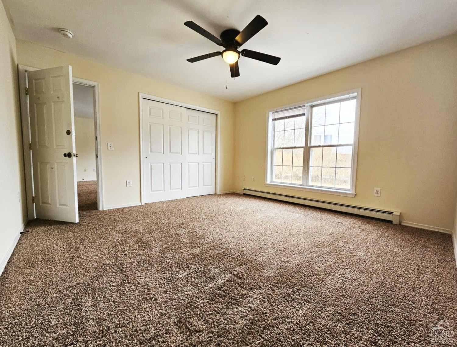274 Fingar Road Hudson, NY 12534 - Photo 48 of 87 a view of a livingroom with a ceiling fan and window