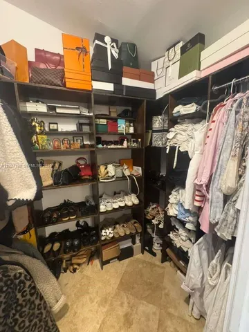 a room with lots of different colored cloths