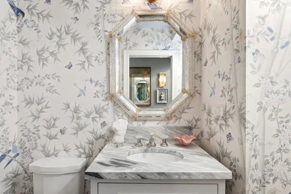 a bathroom with a bathtub and window