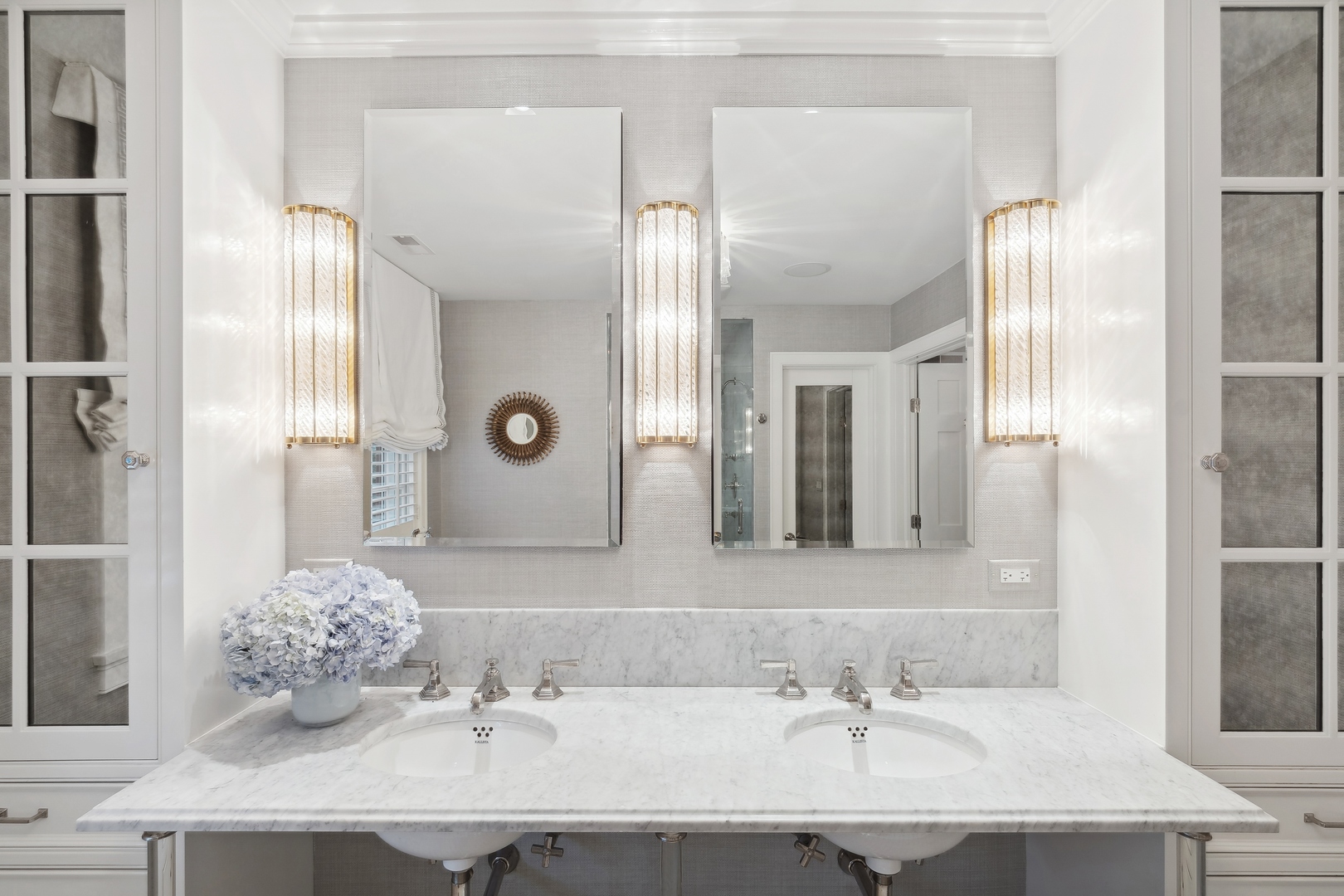 85 Sunset Place Lake Forest, IL 60045 - Photo 38 of 64 a bathroom with a granite countertop sink a mirror and a shower
