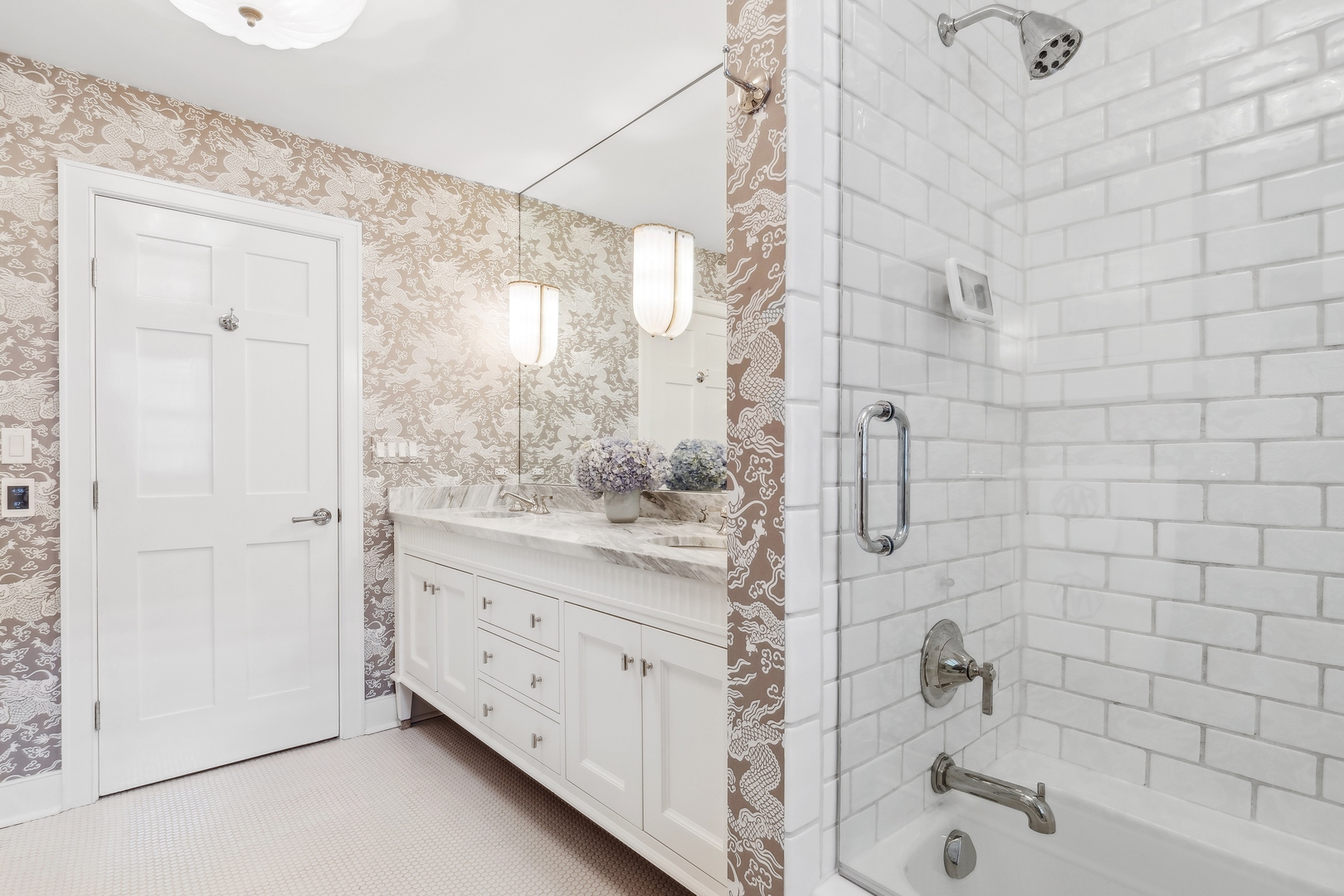 85 Sunset Place Lake Forest, IL 60045 - Photo 42 of 64 a bathroom with a granite countertop sink a mirror and shower