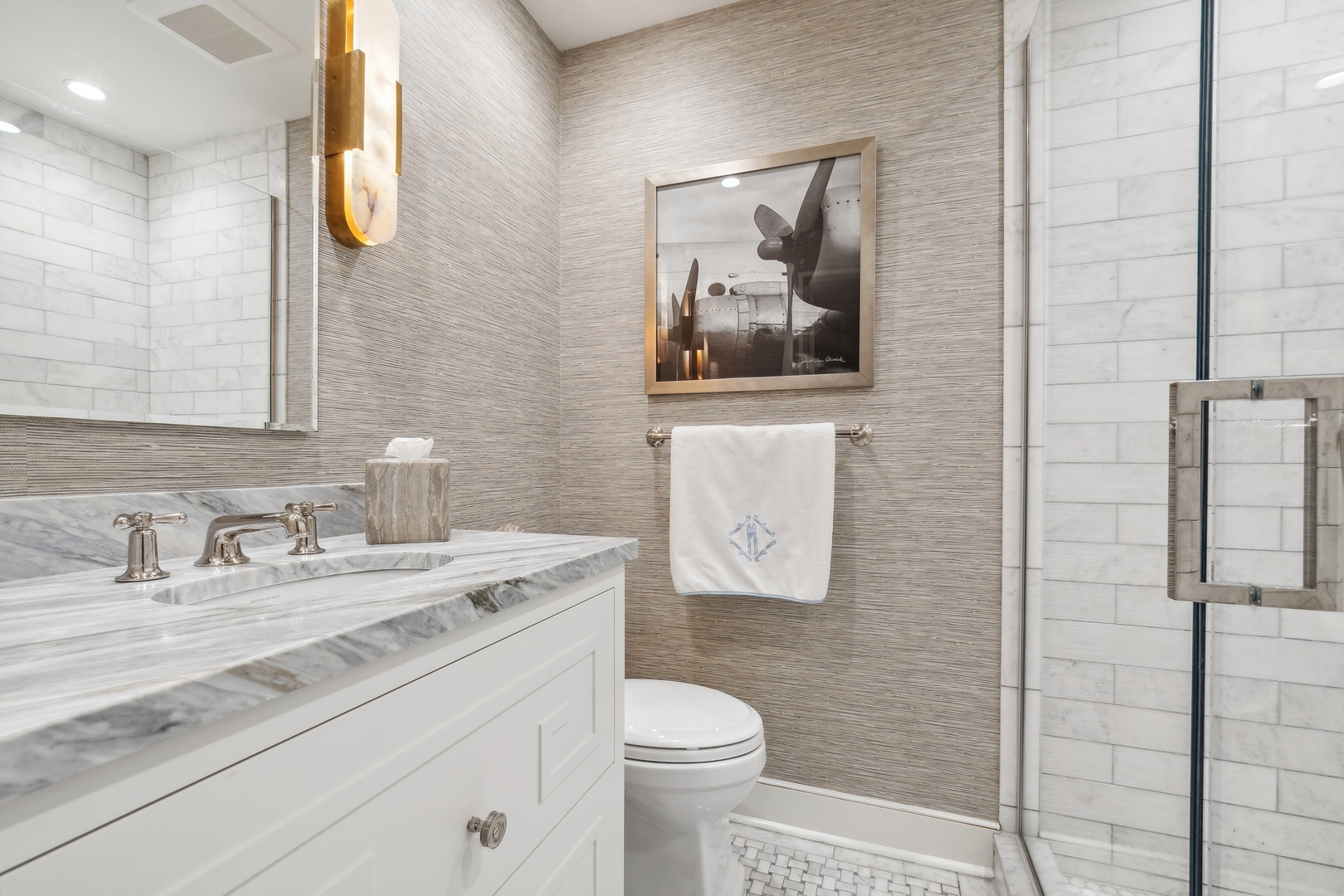 85 Sunset Place Lake Forest, IL 60045 - Photo 44 of 64 a bathroom with a toilet sink vanity and mirror