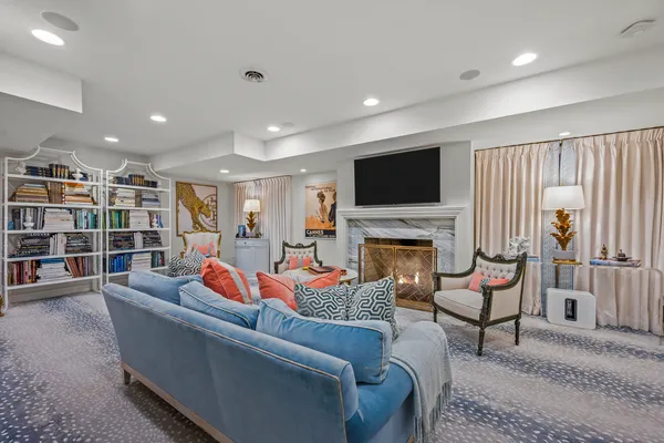 a picture of a bench in front of a wall