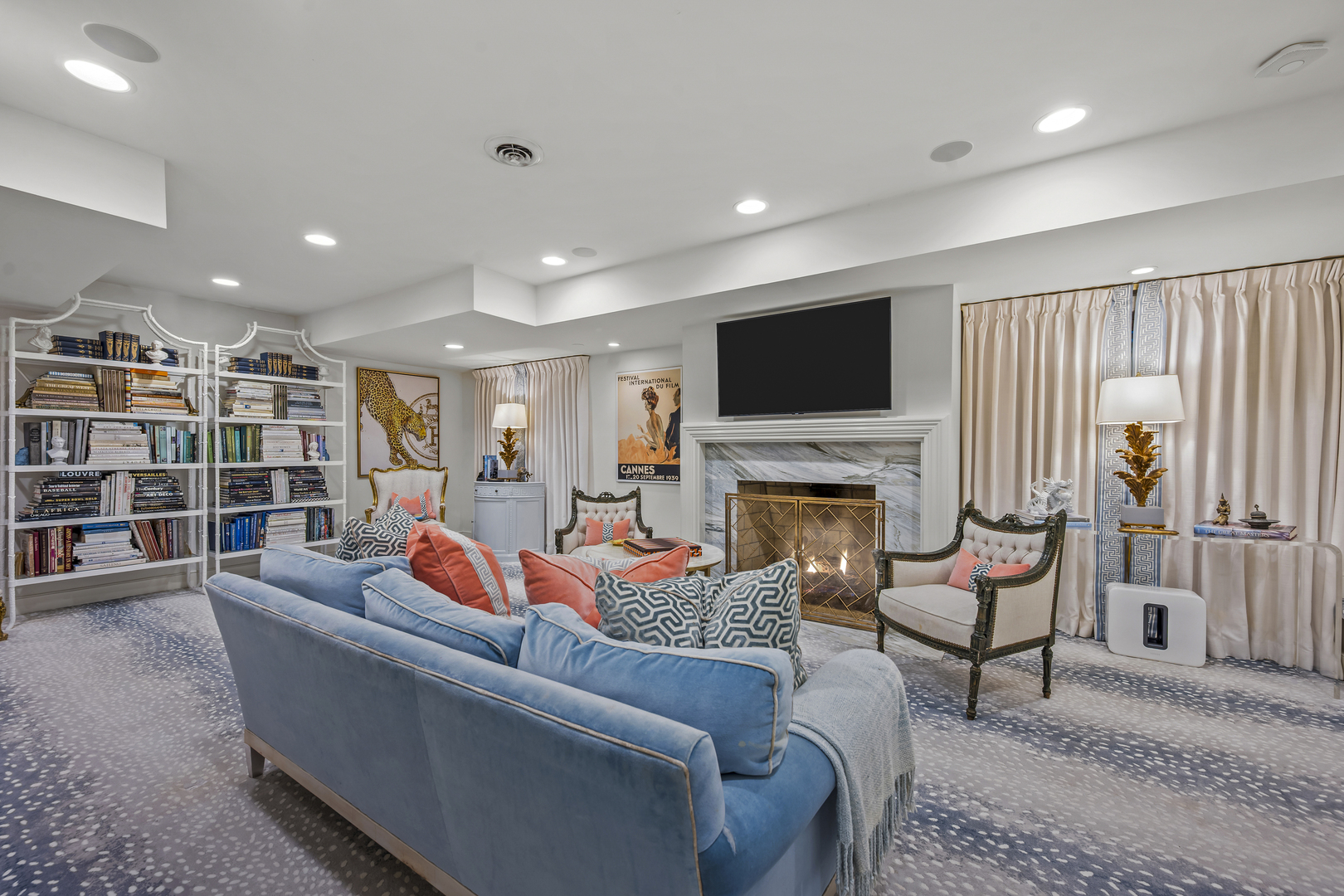 85 Sunset Place Lake Forest, IL 60045 - Photo 50 of 64 a living room with furniture a fireplace and a flat screen tv