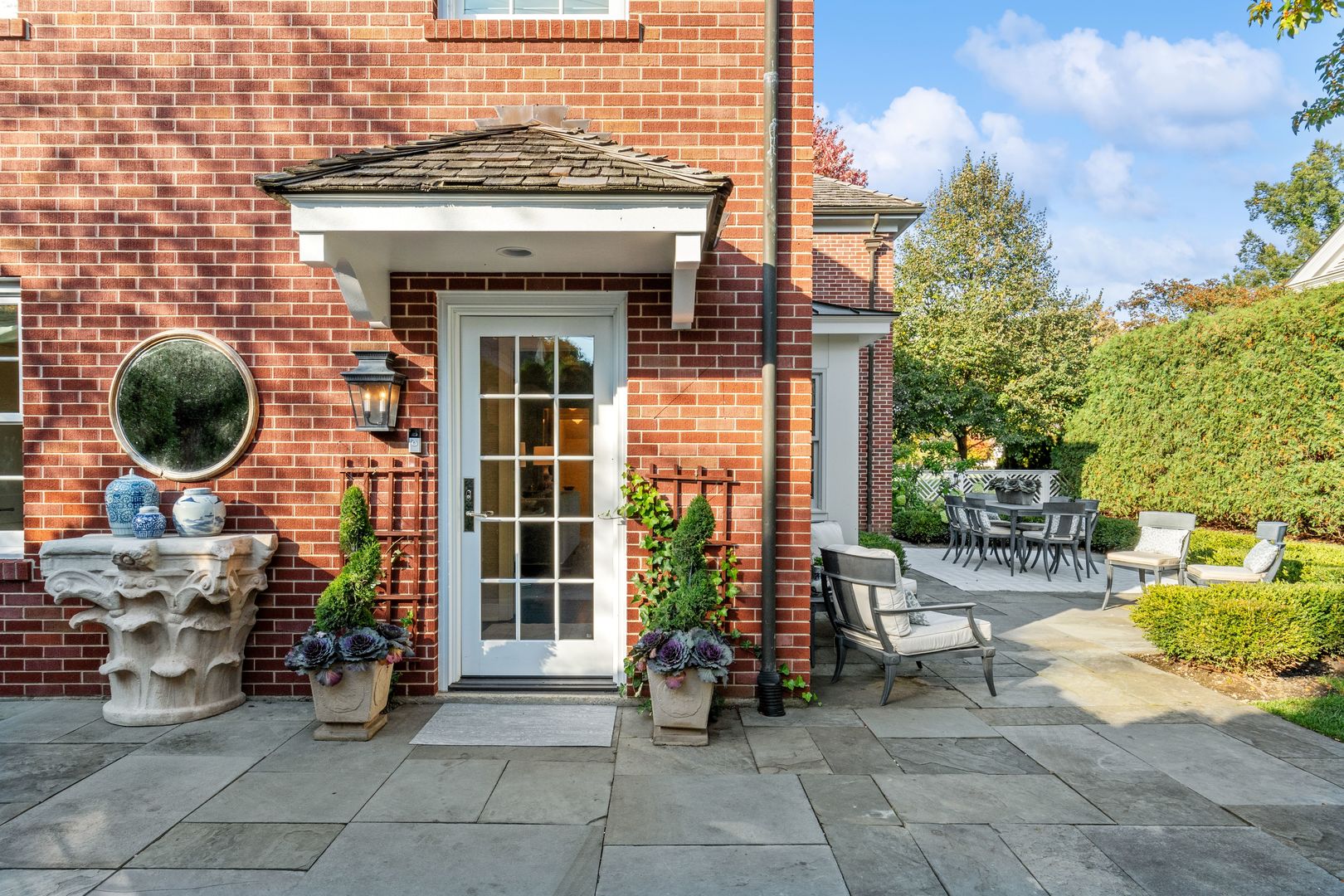 85 Sunset Place Lake Forest, IL 60045 - Photo 57 of 64 a view of a chairs and table in the back yard of the house