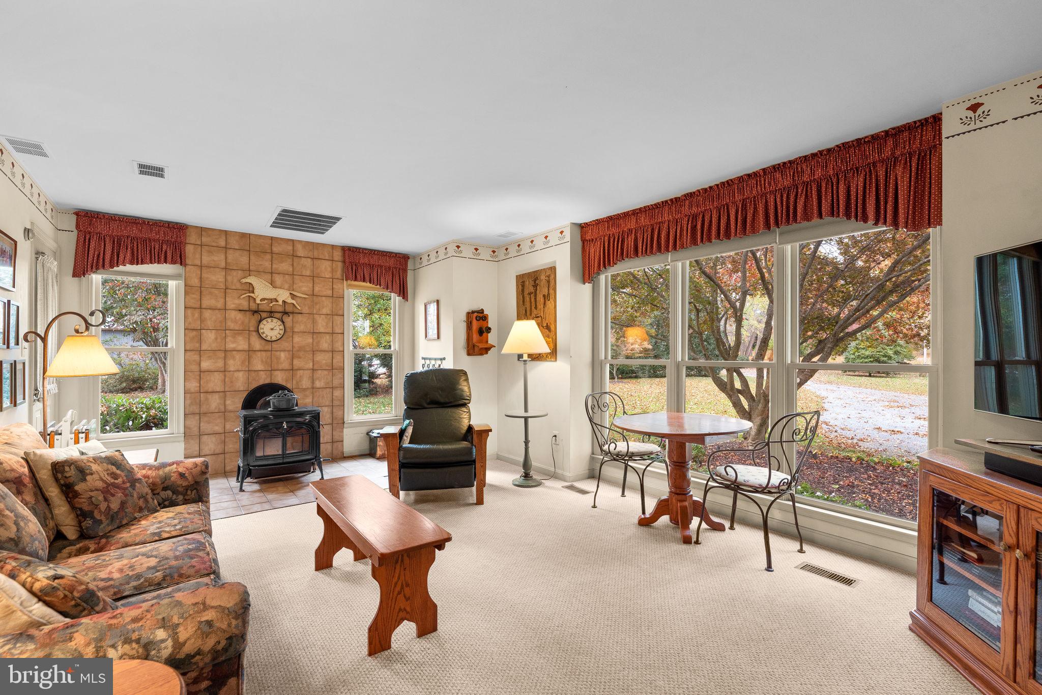 4230 Damascus Road Laytonsville, MD 20882 - Photo 35 of 48 Den with wood stove
